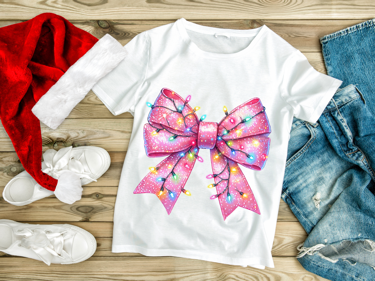Camiseta navideña con lazo rosa