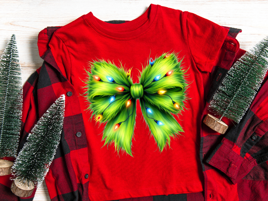 Camiseta navideña con lazo verde